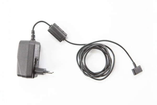 Charger including country-specific adapter + Y-adapter